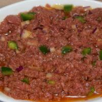 Special Kitfo · Freshly minced extra lean cut of beef seasoned in butter, chili powder flavored with onions,...
