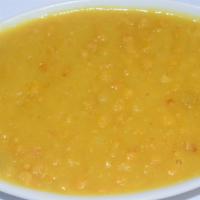 Kik Alicha (Split Peas) · Split peas cooked seasoned with curry, onion, and fresh garlic.