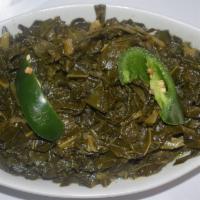 Gomen (Collard Green) · Collard green cooked with onions, olive oil, and fresh garlic.