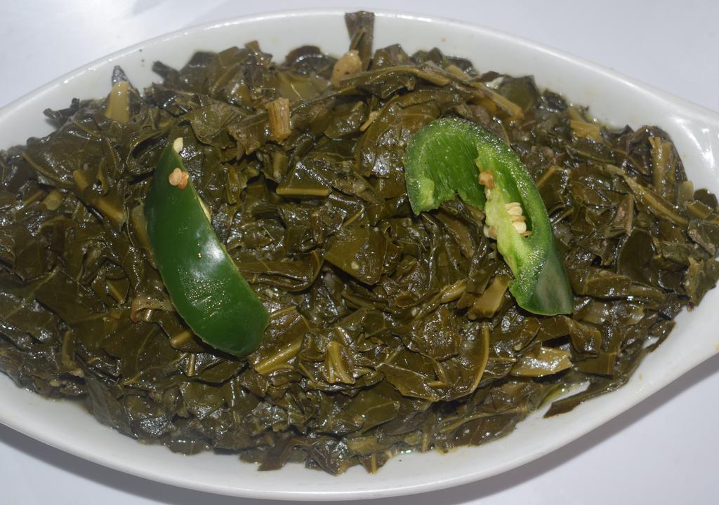 Gomen (Collard Green) · Collard green cooked with onions, olive oil, and fresh garlic.