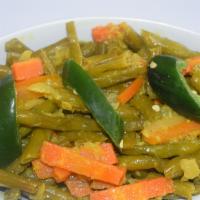 Fossolia (String Beans) · String beans, carrots cooked with onion, olive oil, and fresh garlic.