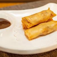 Duck Spring Roll · Served with plum sauce.