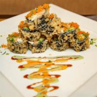 Monster Roll · Black pepper tuna crunchy top with eel, salmon and avocado.

 Consuming raw or undercooked m...