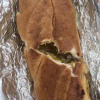 Cuban Sandwich · Pork, ham, swiss, pickles, mustard, mojo sauce.