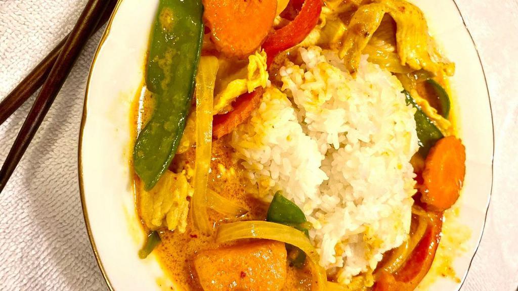 Masaman Curry Vegan (Sweetest) · Gluten-free. Sweet potato, carrot, onion, red bell pepper, snow peas, baby corn topped with crush peanuts in a yellow curry sauce.