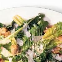 Classic Caesar Salad · Tossed with garlic croutons, shaved parmesan cheese and creamy Caesar dressing.