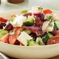 House Greek Salad · Crisp romaine lettuce, tomato, cucumber, kalamata olives, imported feta cheese, stuffed grap...