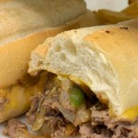 Philly Cheesesteak · Thinly sliced grilled roast beef with fried onions, peppers, mushrooms and melted American c...