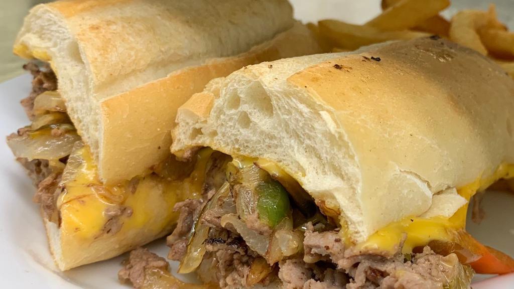Philly Cheesesteak · Thinly sliced grilled roast beef with fried onions, peppers, mushrooms and melted American cheese on a hoagie roll.