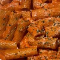 Vodka Sauce · Creamy pink vodka sauce, contains onions, heavy cream, vodka, butter and tomato sauce. DOES ...