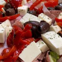 Large Cold Antipasto Salad · A mix of Romaine Lettuce, Tomatoes, Salami, Provolone Cheese, Ham, Roasted Peppers, Greek Ol...