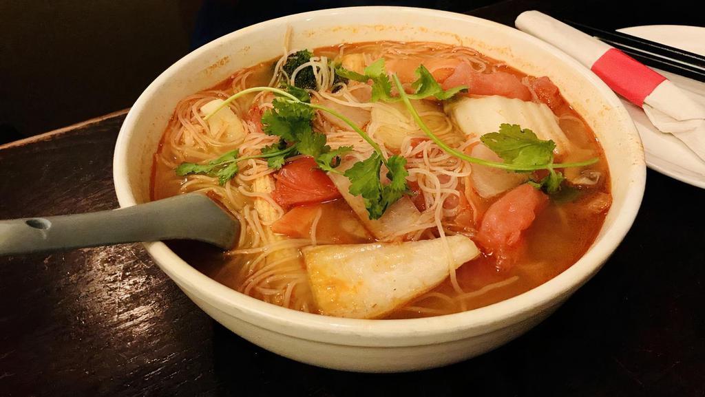 Tom Yum Noodles · Spicy. Rice noodles served in spicy and sour lemongrass broth with straw mushroom.