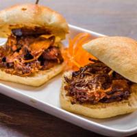 Pulled Pork Panecillo · House made guava Bbq sauce.