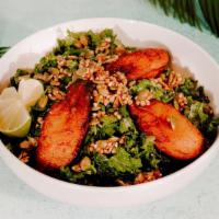 Plantain Salad · Citrus rubbed kale topped with buckwheat crunch and sweet plantains.