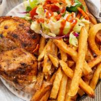 Our Famous Half Chicken Platter · Our best-selling half chicken slowly cooked over hickory wood. Served with hand-cut fries an...