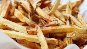 Hand Cut Spicy Fries · Steak cut Idaho French fries topped with Cajun spices.