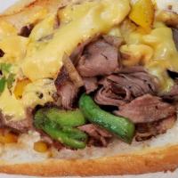 Philly Cheese Steak Sandwich · Philly cheesesteak sandwich made from thinly sliced pieces of beefsteak and melted cheese in...