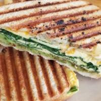 Spinach & Pesto Breakfast Sandwich · Sourdough toast stuffed with spinach sautéed with a touch of red pepper flakes, fresh basil ...
