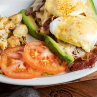 Baja Benedict · Start California dreaming with a parmesan toasted English muffin topped with turkey, crisp b...