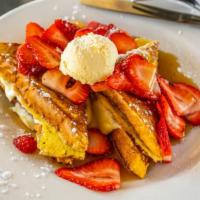 Stuffed French Toast · Custard dipped french toast stuffed with a vanilla ricotta and cream cheese filling with a t...