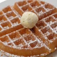 Belgian Waffle · A crisp waffle made for you, topped with a sprinkle of powdered sugar.