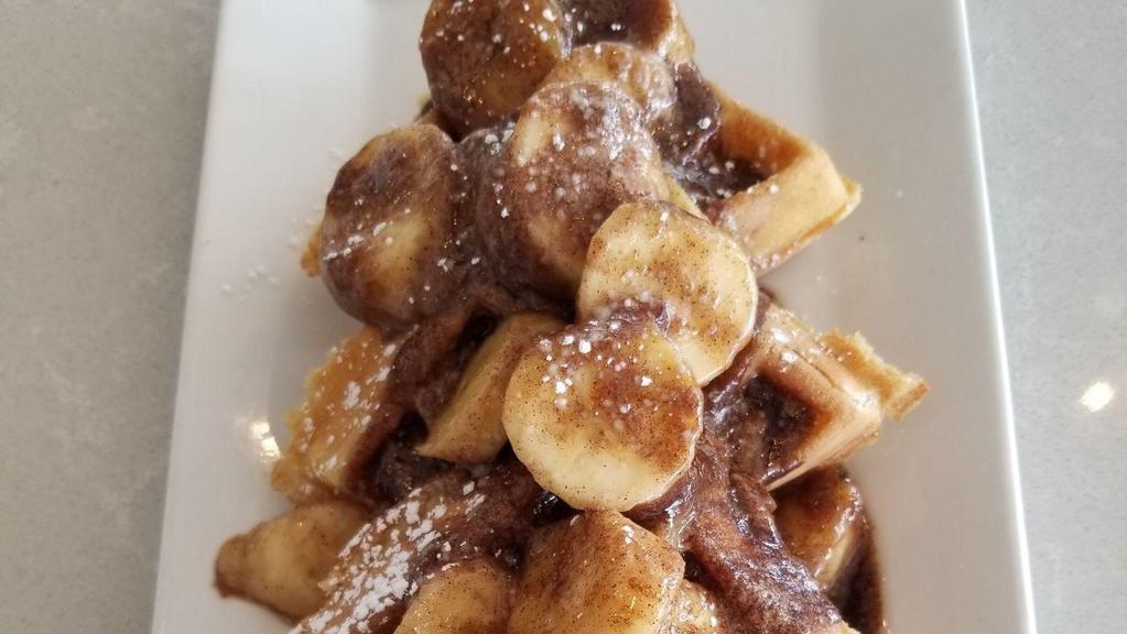 Banana Fosters Waffle · Fresh bananas sautéed in cinnamon, brown sugar and butter and poured over a crispy Belgian waffle. 939 cal.