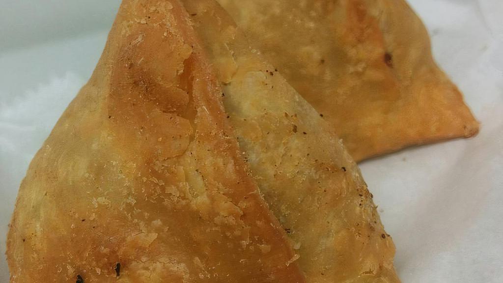 Vegetable Samosa · Crisp turnovers filled with spiced potatoes and green peas.