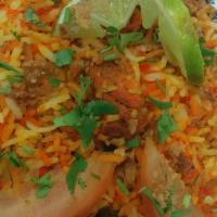 Chicken Tikka Biryani · Spiced chicken tikka with basmati rice.