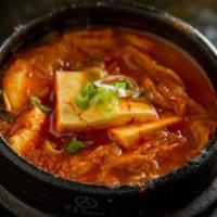 Kimchi Bowl · Traditionally prepared vegetables, kimchi and eggs over rice.