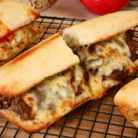 American Philly Steak Hero · Delicious and juicy steak with american cheese and grilled onions.