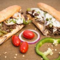 Ny Philly Steak Hero · Delicious and juicy steak with mozzarella cheese, grilled mushrooms, onions, and peppers.