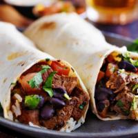 Steak Burrito · Juicy steak with rice, beans, pico de gallo, cheese, salsa, and sour cream on flour tortilla.