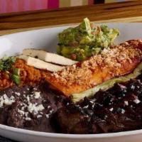 Tampiqueña · Grilled Certified Angus Beef® NY strip steak, cheese enchilada, Mexican rice, refried beans,...