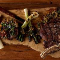 Ribeye · 22oz bone-in Certified Angus Beef® ribeye steak, grilled Cambray onions, chile roasted potat...