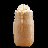 Mocha Caramel Cappuccino Shake · Mocha Ice Cream, Caramel & Chocolate Syrup Drizzle topped with Whipped Cream