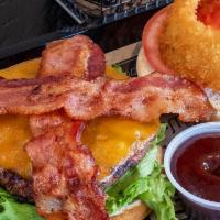 Texas Burger · LETTUCE, TOMATO, BACON, ONION RING, CHEDDAR CHEESE, BBQ SAUCE