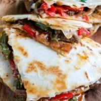 Steak Quesadilla · CHOPPED SIRLOIN, PEPPERS, ONIONS & CHEDDAR JACK CHEESE. SERVED WITH A SIDE OF SOUR CREAM & S...