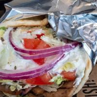 Beef Gyro · SEASONED CHAR BROILED BEEF STRIPS WITH LETTUCE, TOMATOES, RED ONIONS AND TZATZIKI SAUCE
