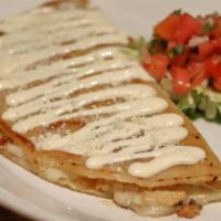 Taqueria: Quesadillas (Corn Tortilla) · Popular Handmade corn tortilla, stuffed with cheese topped with lettuce, tomato, cheese and ...