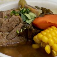 Beef Soup  - Sopa De Res  - Grande · Flavorful and hearty beef soup to warm up the soul. Served with rice and corn tortillas.
Sop...