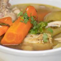 Chicken Soup  - Sopa De Pollo  - Grande · Rich and hearty traditionally made chicken soup. Large soup Served with rice and corn tortil...