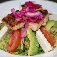 Ensaladas - Salads: Esalada De Salmon A La Parilla · Grilled Salmon Filet salad Central American style.