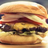 1/4 Pound Everything Cheese Burger · 1/4 cheeseburger seared on the grill on a toasted potato bun, lettuce, tomato, raw onions, p...