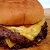 Smashup Cheeseburger · 2 thinly smashed Angus ground beef seared on the grill on a toasted potato bun with yellow A...