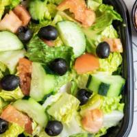 Garden Salad · romaine lettuce, tomato, cucumber & black olives with your choice of dressing