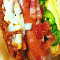 Spiced Chilli Cheese Dogz · Premium Wagyu beef dog topped with chili, queso, bacon, onions jalapeno peppers