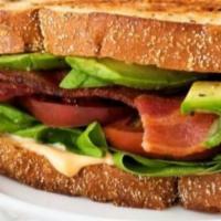 Blta Sandwich · Smoked slab bacon, lettuce, tomato, avocado, pickles, chipotle aioli. On choice of 7 grain, ...