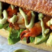 Grilled Shrimp And Avocado Sandwich · Marinated wild Gulf shrimp, smoked crispy bacon, organic avocado, arugula, pickles, sriracha...