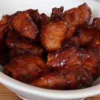 Honey Chipotle Wings · 6 pieces tossed in homemade honey chipotle sauce. Gluten-free. Choice of homemade ranch or h...