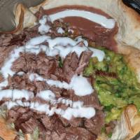 Macho Bowl Bistec (Steak) · Baked flour tortilla filled with rice, refried beans, guacamole, pico gallo, sour cream, and...